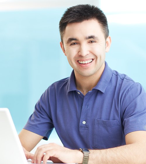 Man with tooth colored adult orthodontics