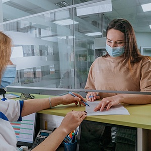 Patient learning about options for paying for braces