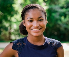 Teen patient with beautiful smile after orthodontics