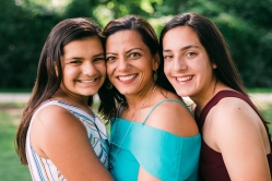 Three actual patients smiling together