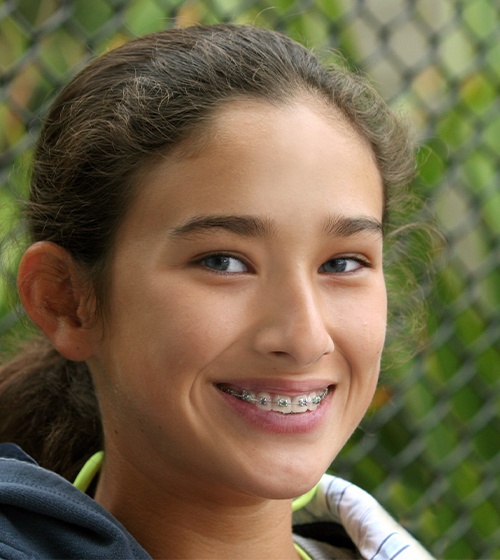 Teen girl with braces smiling