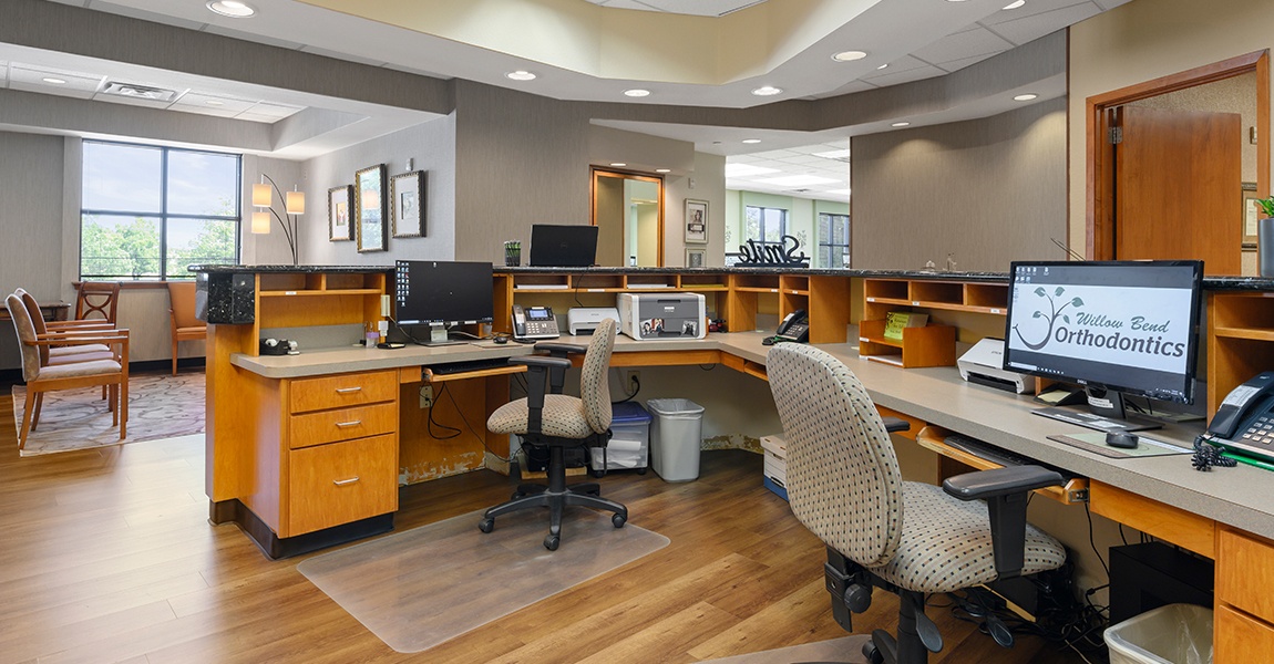 View of dental office from behind reception desk