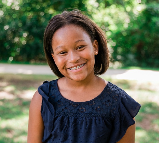 Patient with self ligating braces smiling