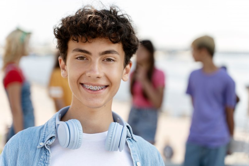 Smiling person with braces